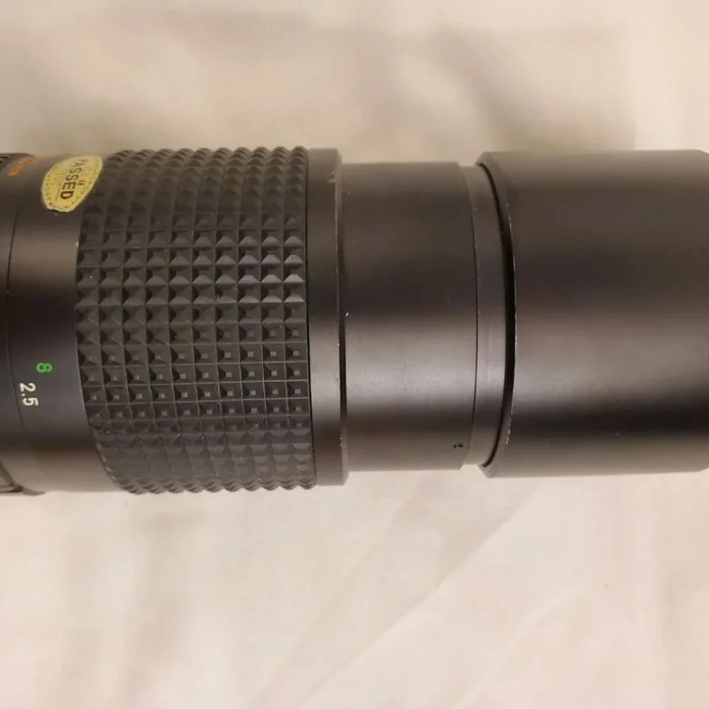MINOLTA MC TELESCOPING ROKKOR-X 1:4 F=200MM CAMERA LENS 1013688